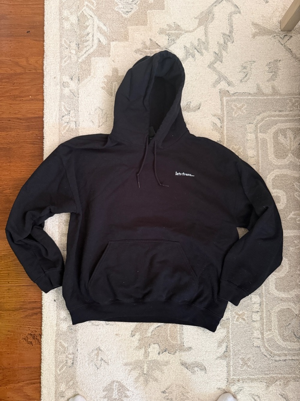 Black Hoodie Sweatshirt with iets frans logo text in white